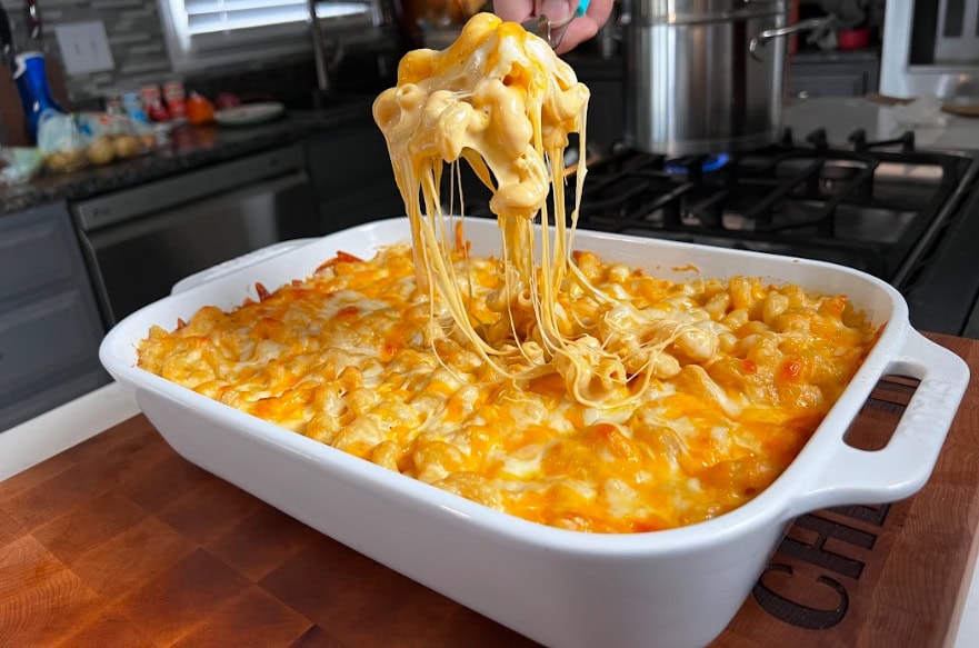 Mac and Cheese spoonful with lots of cheese.