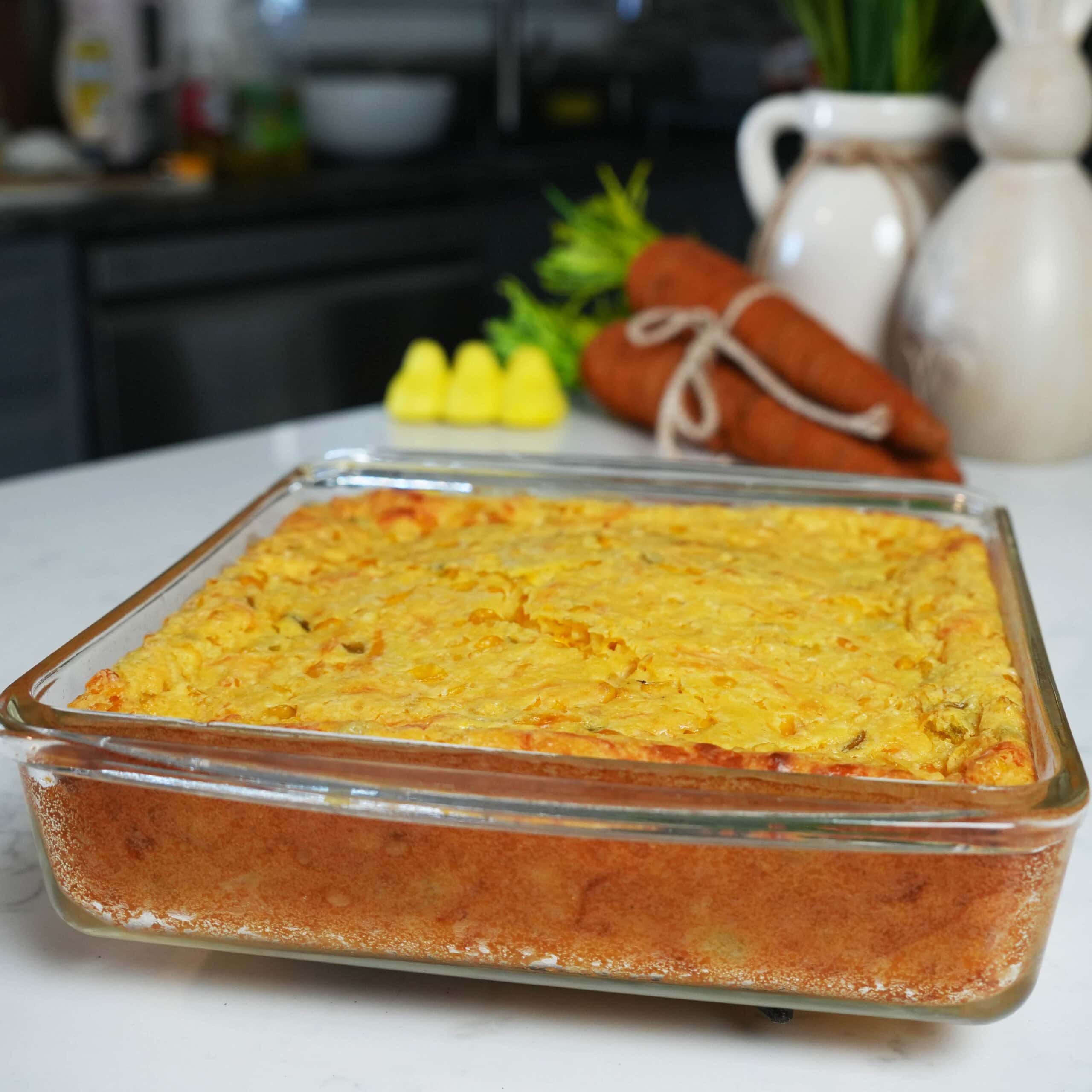 Cheesy Corn Casserole fresh out the oven to cool.