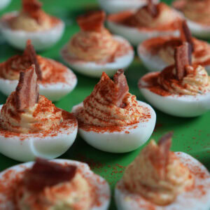 A plate full of deviled eggs.