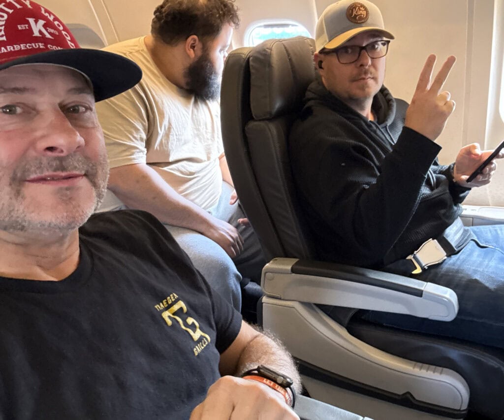 Tim and Neal on a plane.