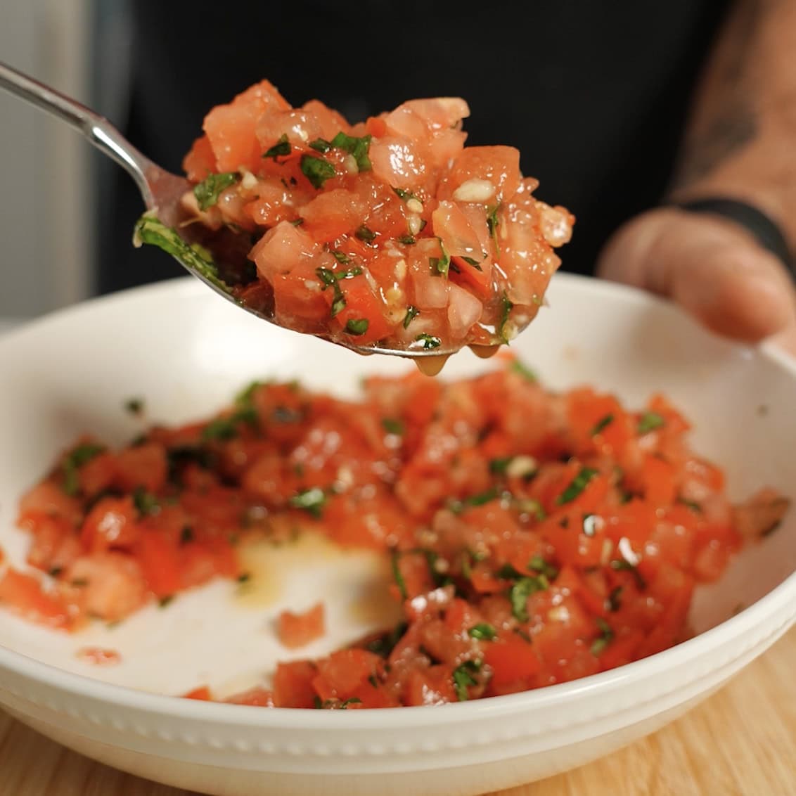 A spoonful of mixed Bruschetta.