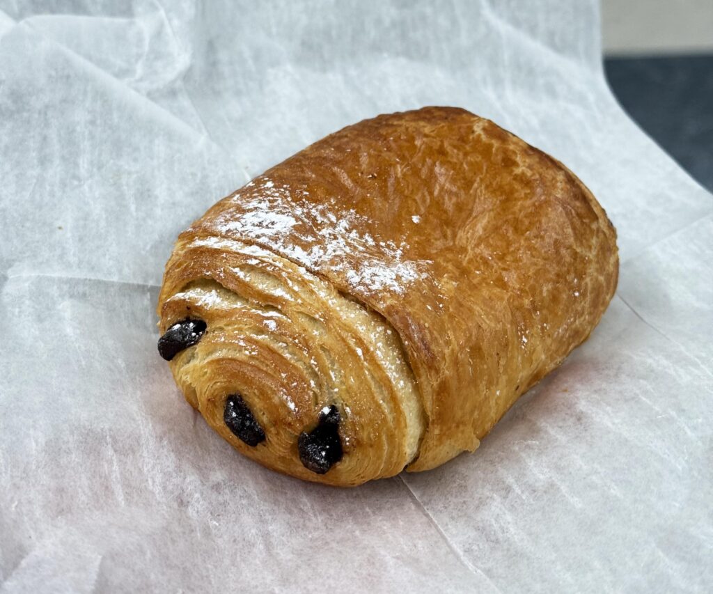 a pastry on parchment paper.