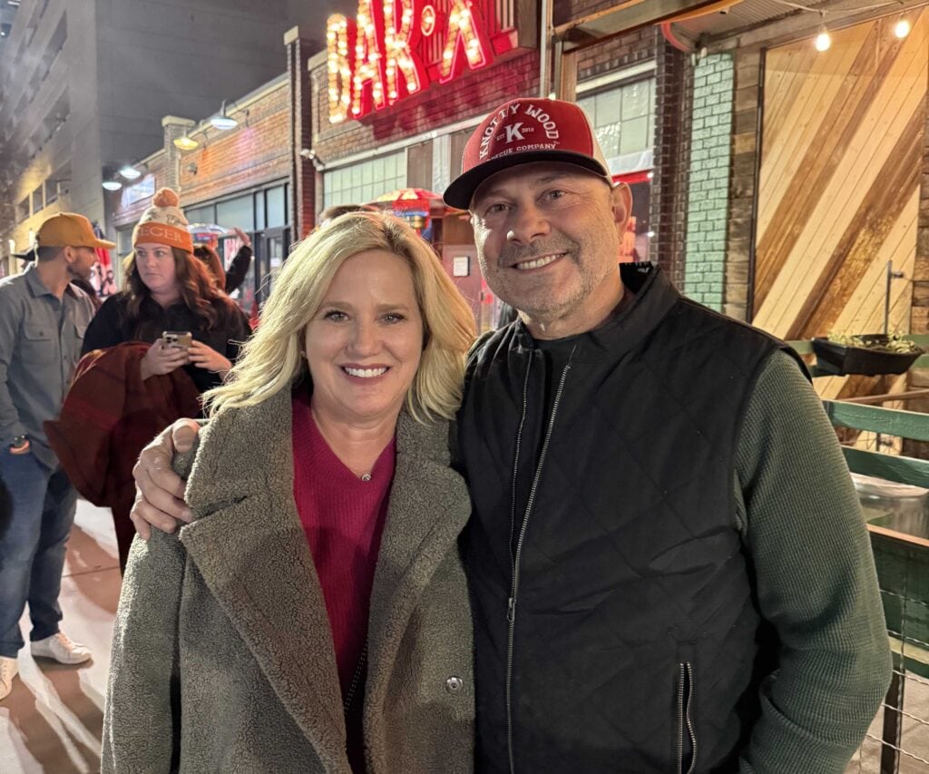 Tim and a lady at Traeger event in Utah.