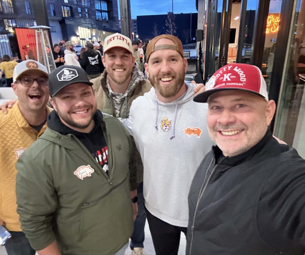 Tim and a group of guys at the Traeger Summit 2025.