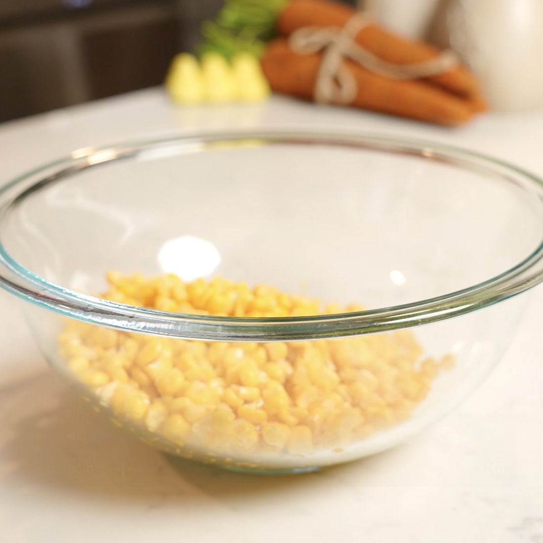 Corn in a mixing bowl.