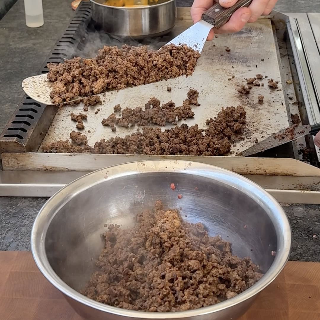 Browning taco meat on the griddle.