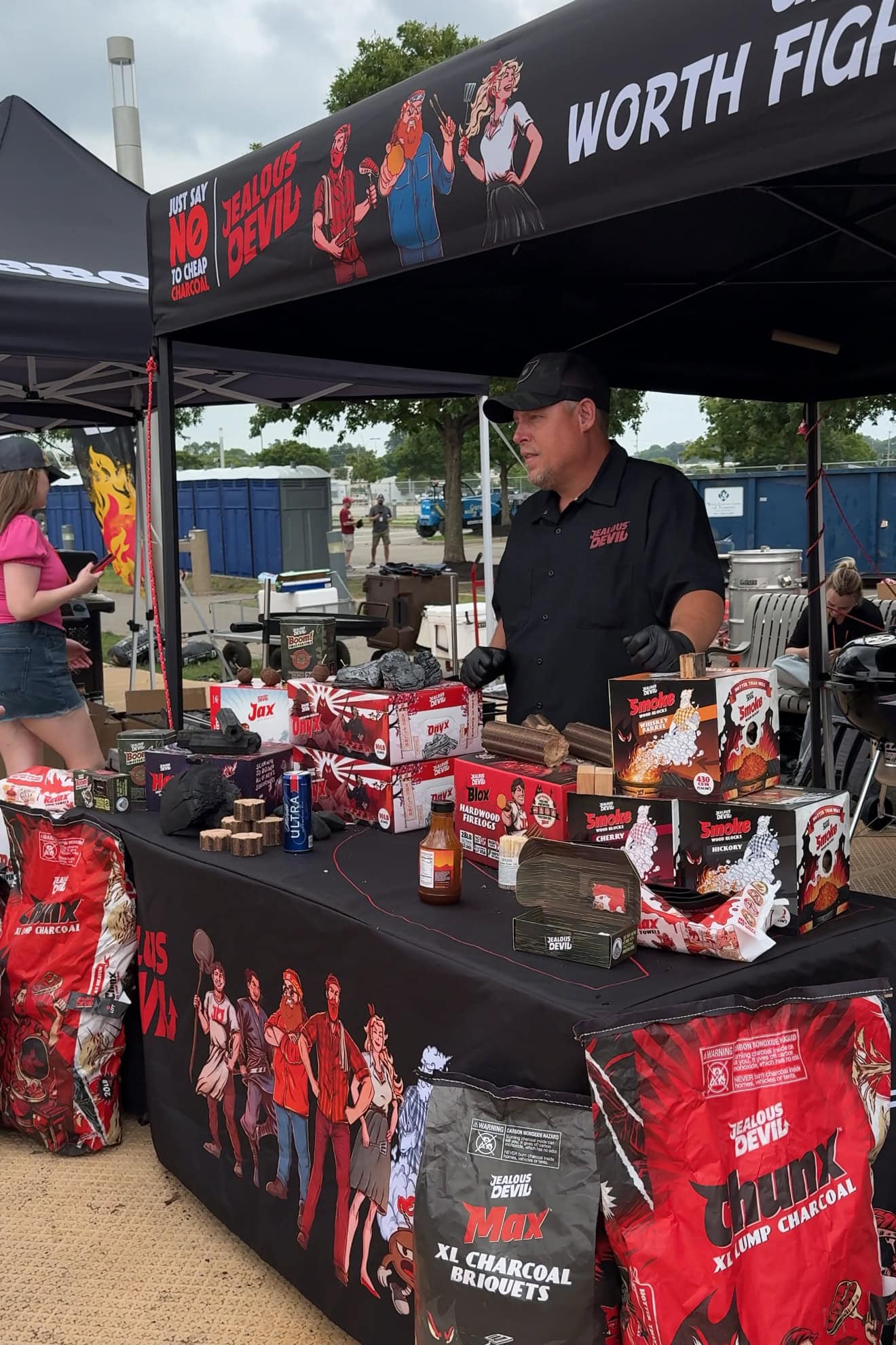 Jealous Devil booth and display with all of their products