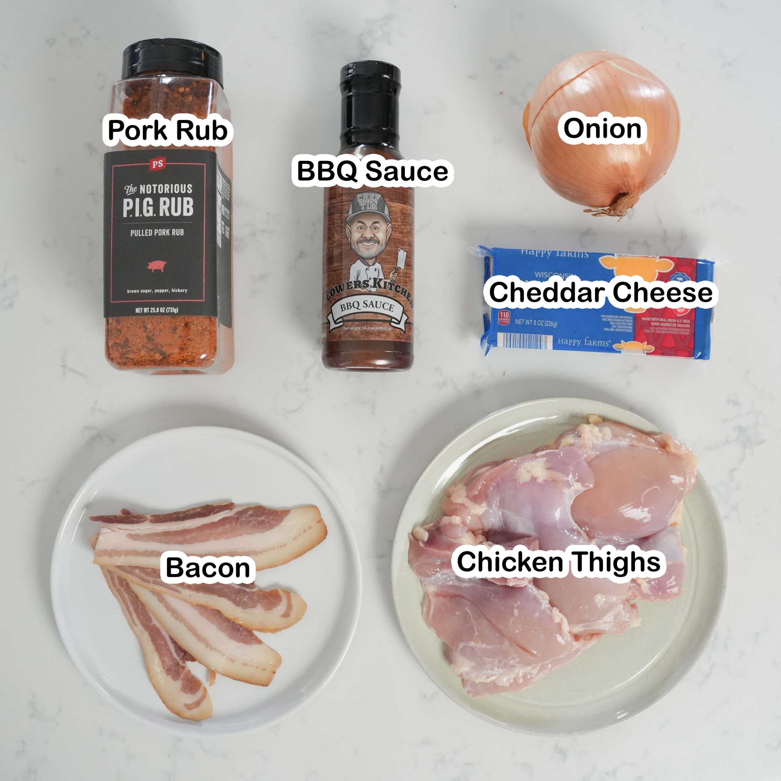Ingredients for smoked chicken thighs laid out on countertop.