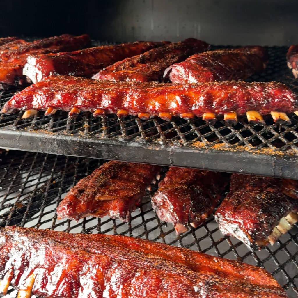 Slab of ribs on the smoker at Smoke Slam