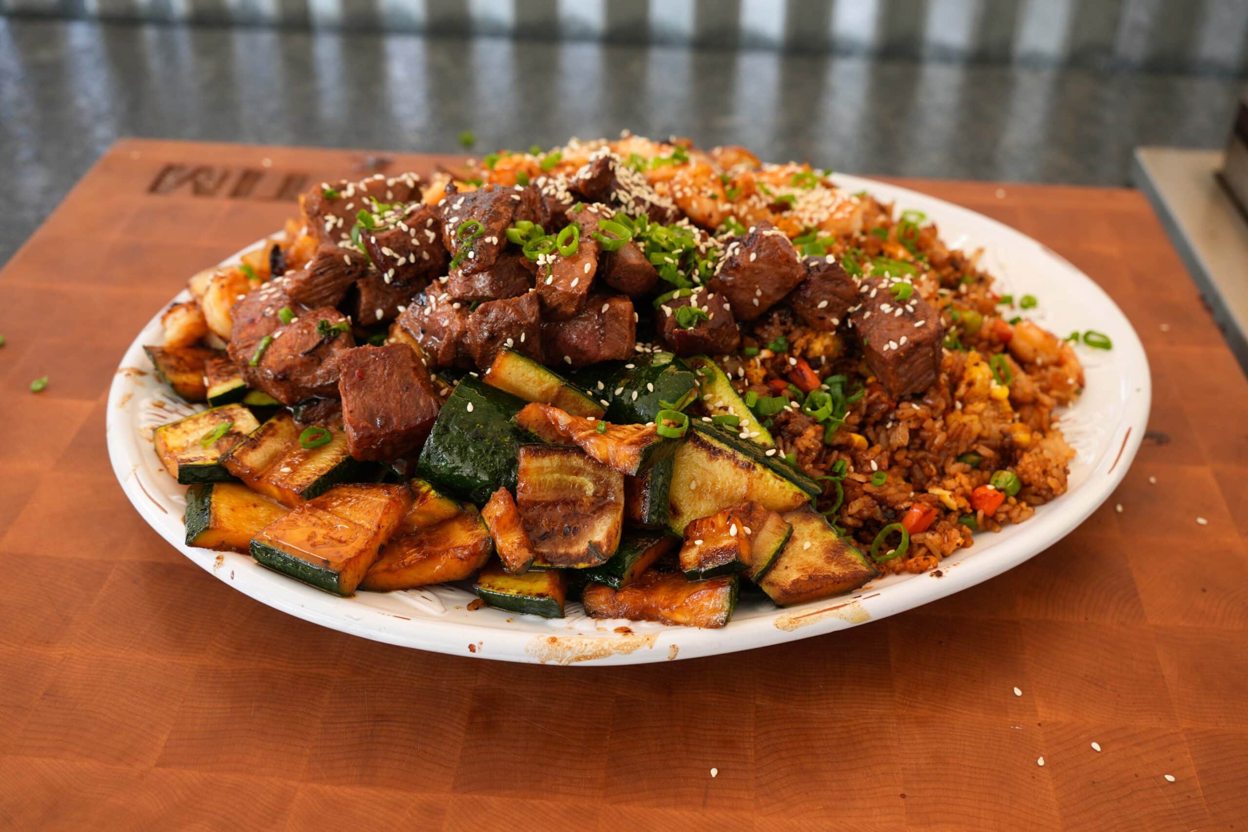 A plate of steak and shrimp hibachi.