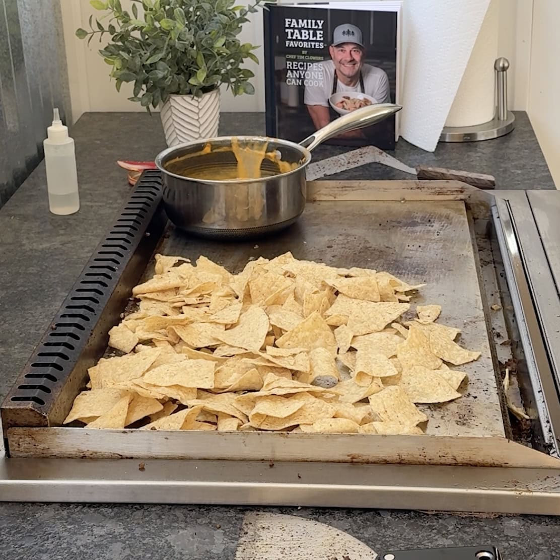 Tortilla Chips laid out across the griddle.