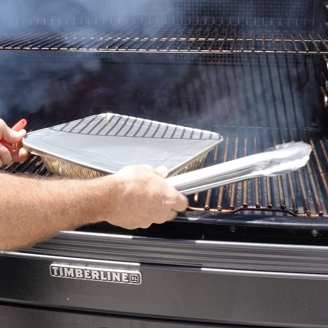 Covered ribs going on smoker.