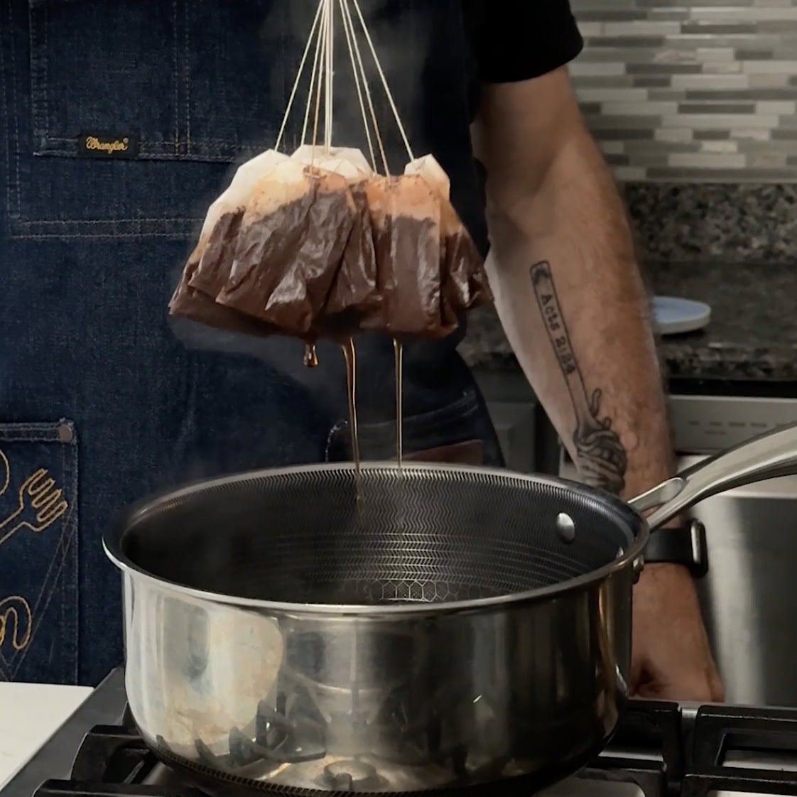 Tea Bags being removed from the boiling water