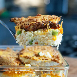 A scoop of chicken and potato chip casserole.
