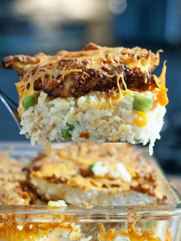 A scoop of chicken and potato chip casserole.