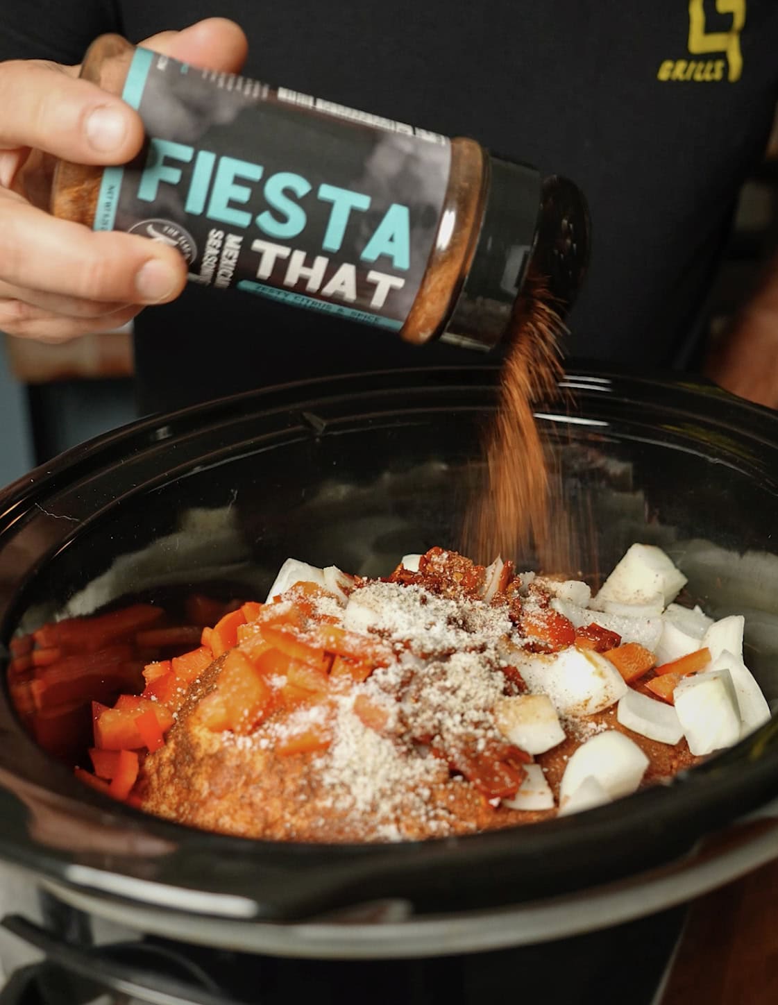 Fiesta That seasoning going into a crock pot.