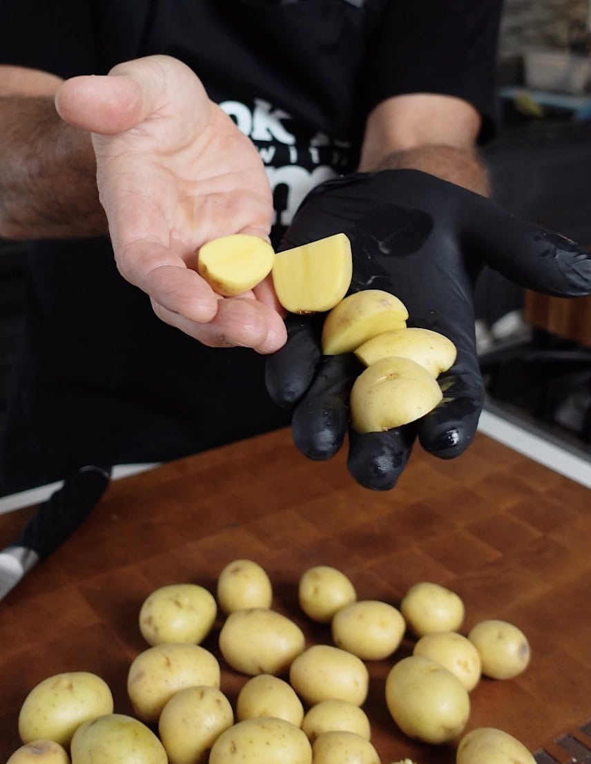 Cut potatoes ready for seasoning.