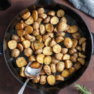 Roasted Rosemary Potatoes in a skillet.