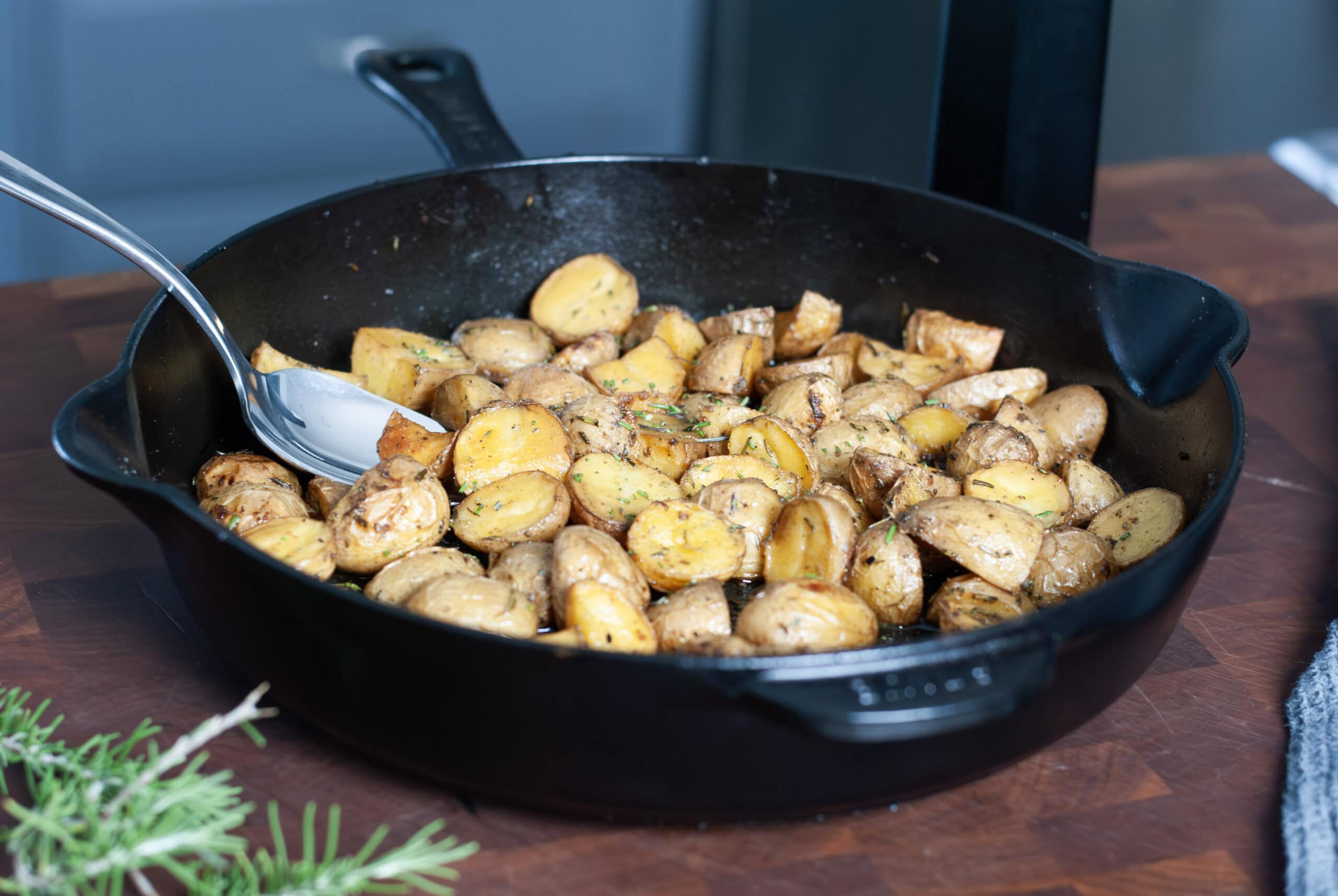 Roasted Rosemary Potatoes in a skillet.