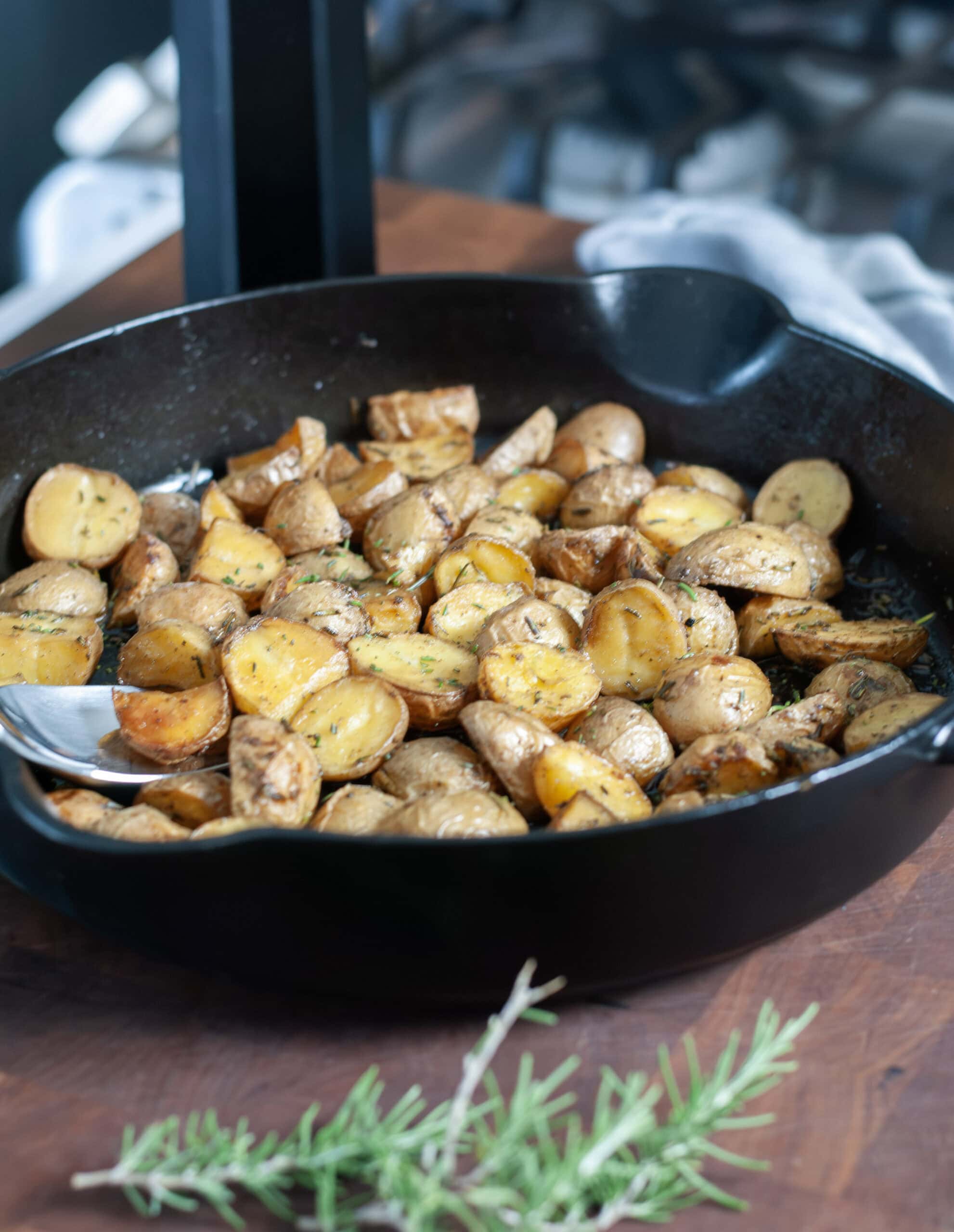 Roasted Rosemary Potatoes in a skillet.