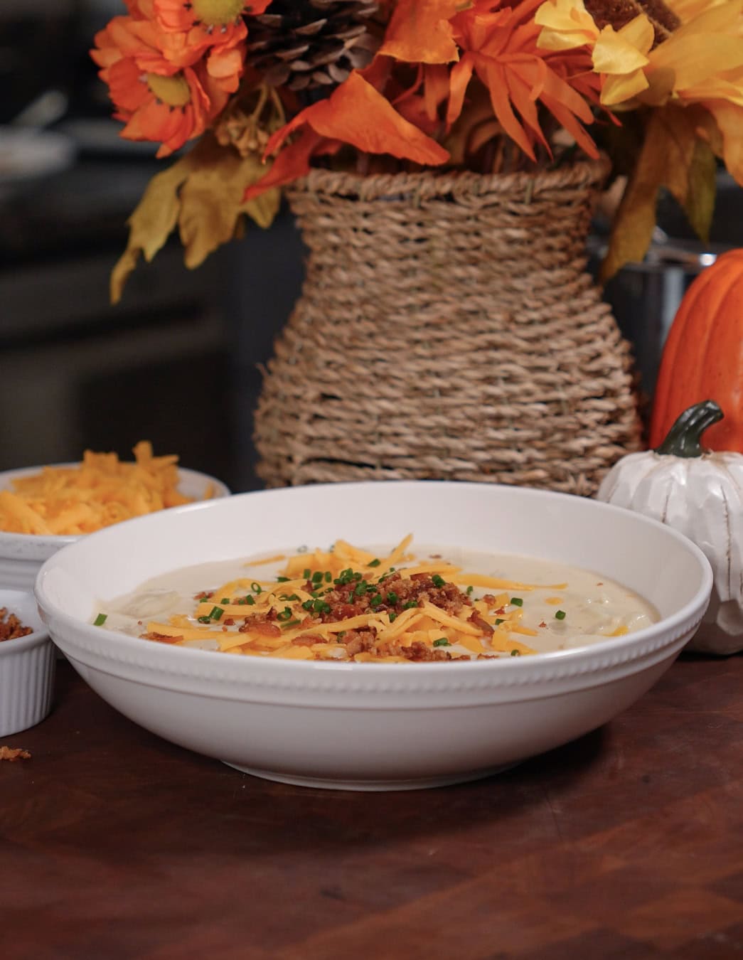 Baked potato soup with cheese and chives.