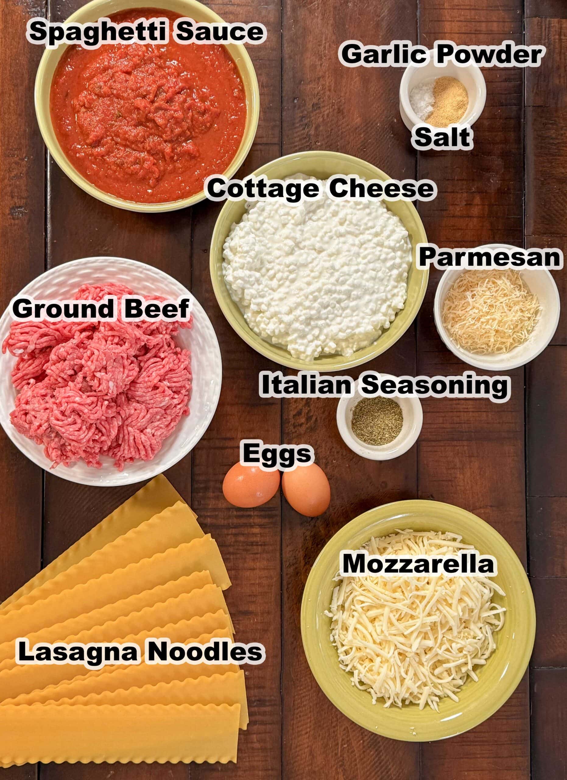 Ingredients labeled and measured for a lasagna recipe.