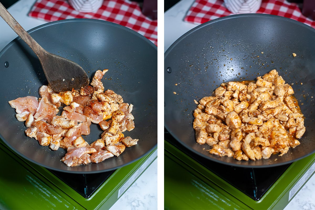 Chicken cooking in a skillet with seasonings.
