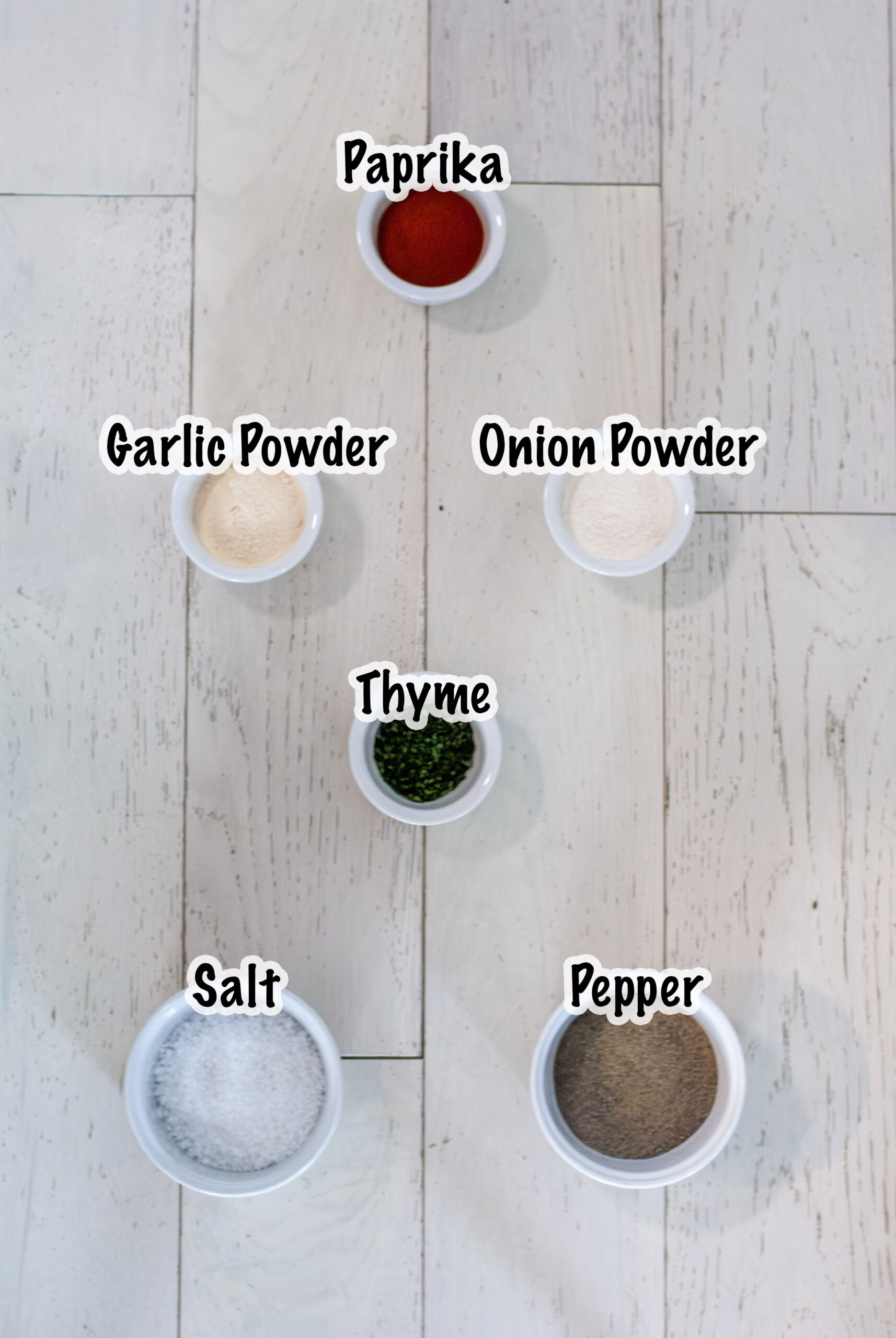 Ingredients for Prime Rib Seasoning measured in glass bowls.