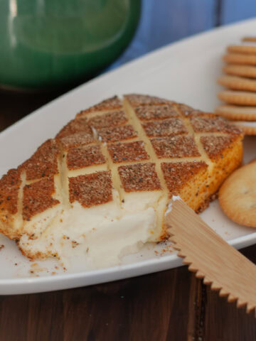 Smoked Cream Cheese on a plate with crackers.