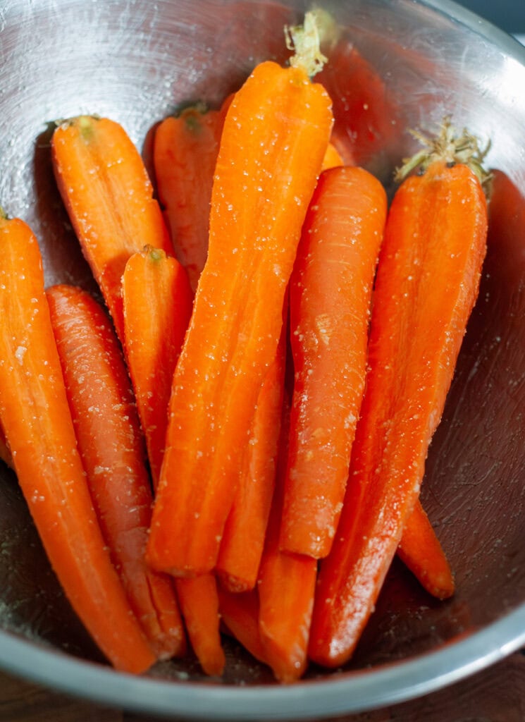 Seasoned carrots in a bowl.