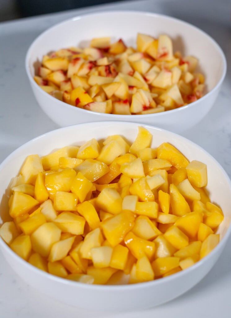 Sliced peaches and mangos.