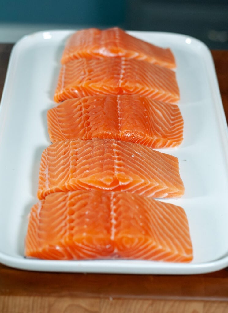 Salmon sliced into 8 oz steaks.