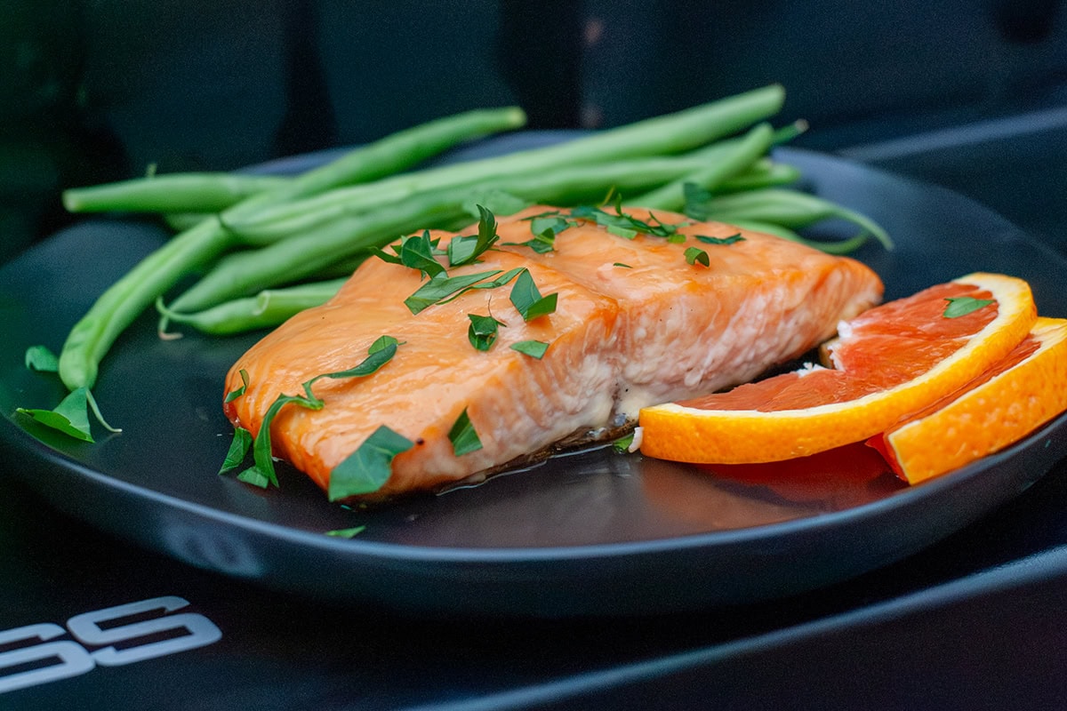 Pellet grilled salmon with orange slices.