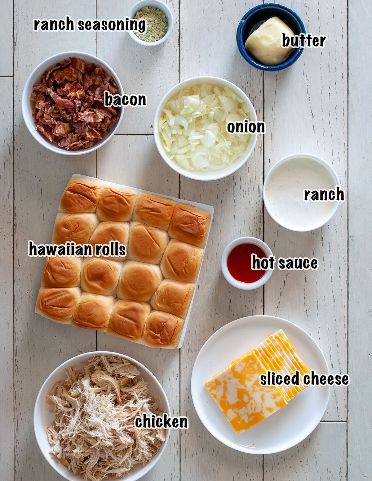Labeled ingredients for making bacon chicken ranch sliders.