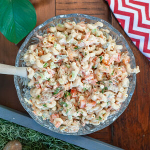Chicken macaroni pasta salad topped with fresh dill.