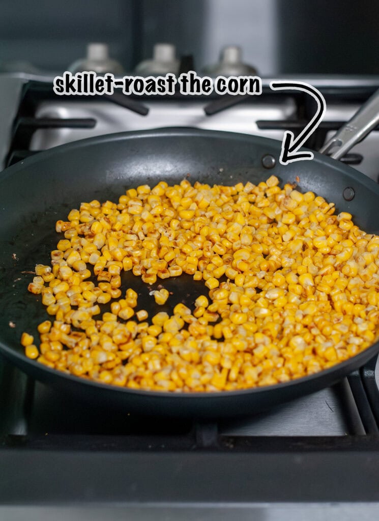 Frozen corn roasting in a skillet. 