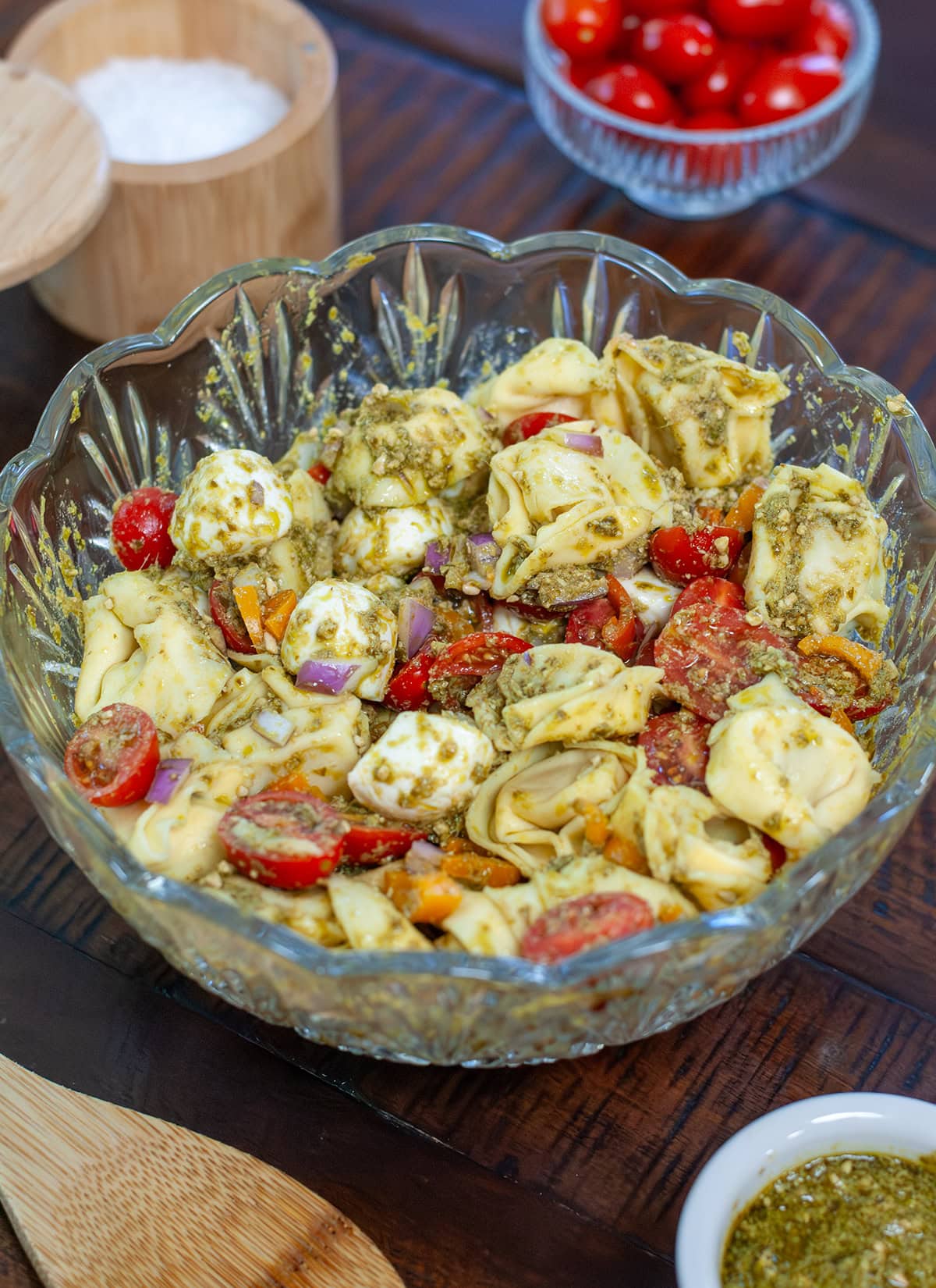 Close up view of tortellini pesto pasta salad. 