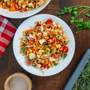Roasted Corn Salad with parsley and vegetables.