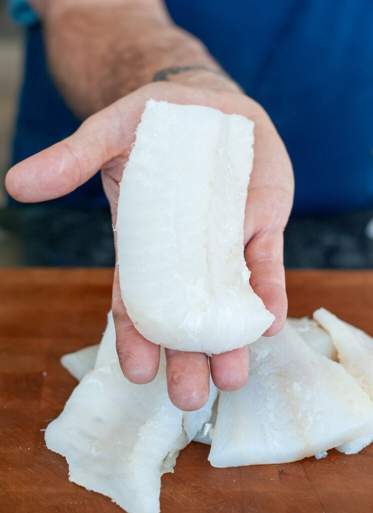 Even sized slices of cod.