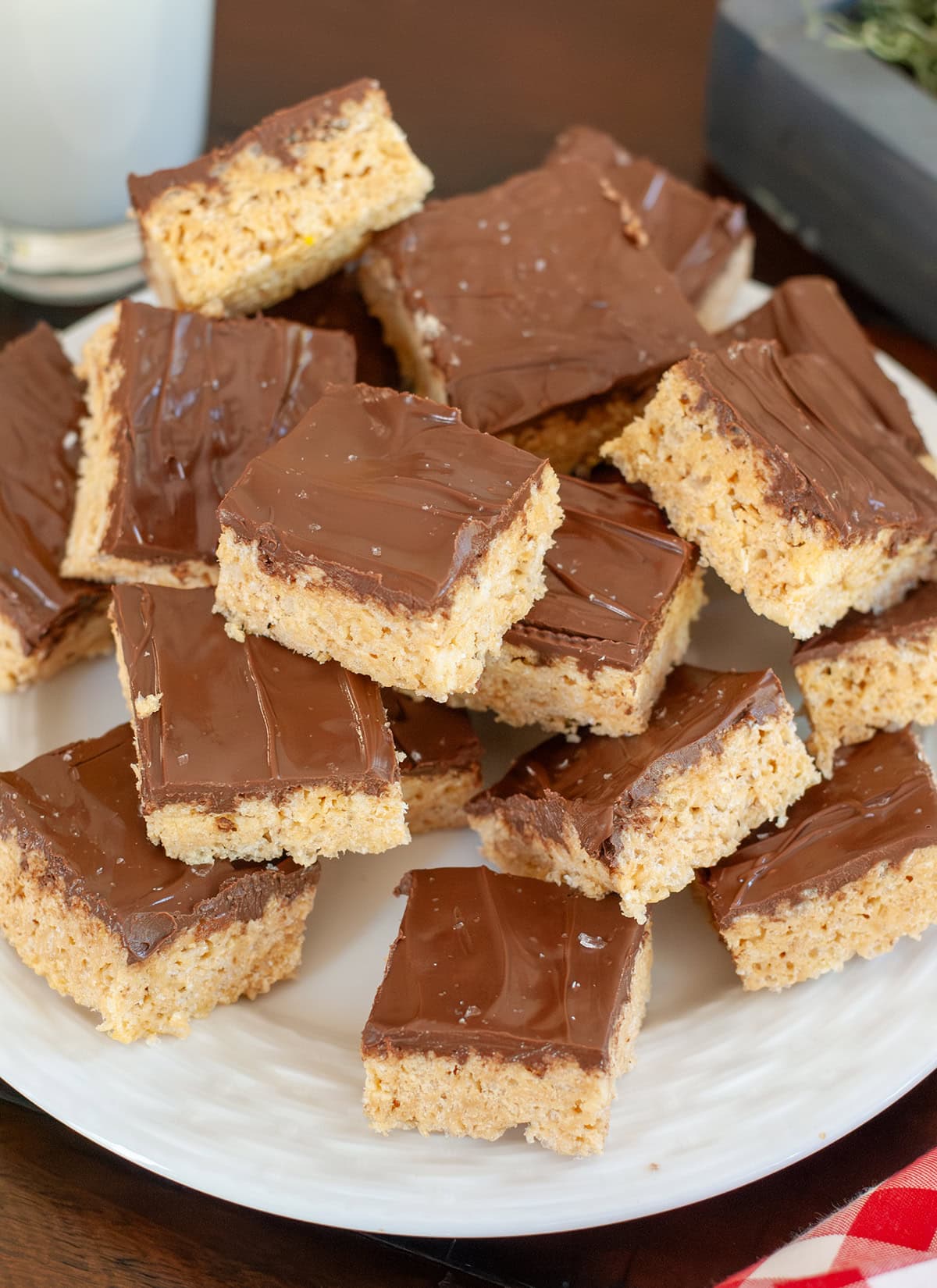 A platter of treats showing a layer of chocolate. 