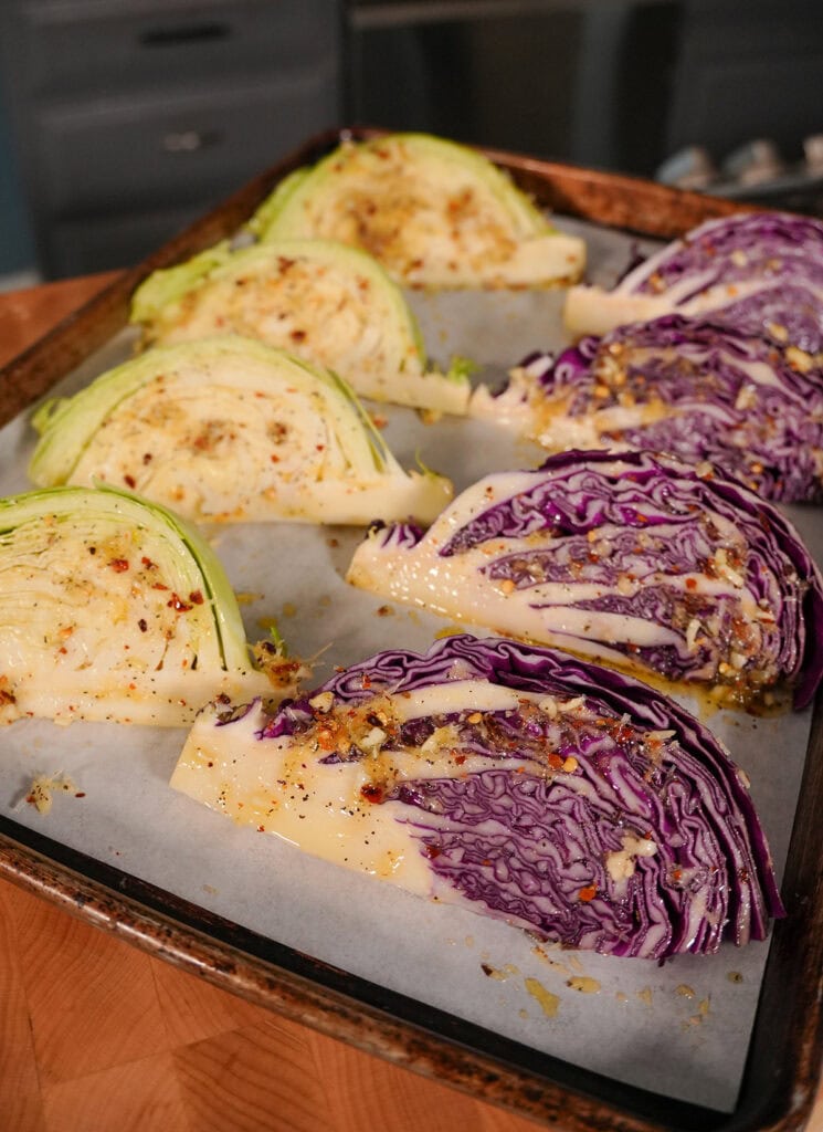 A pan of cabbage wedges ready for the grill. 