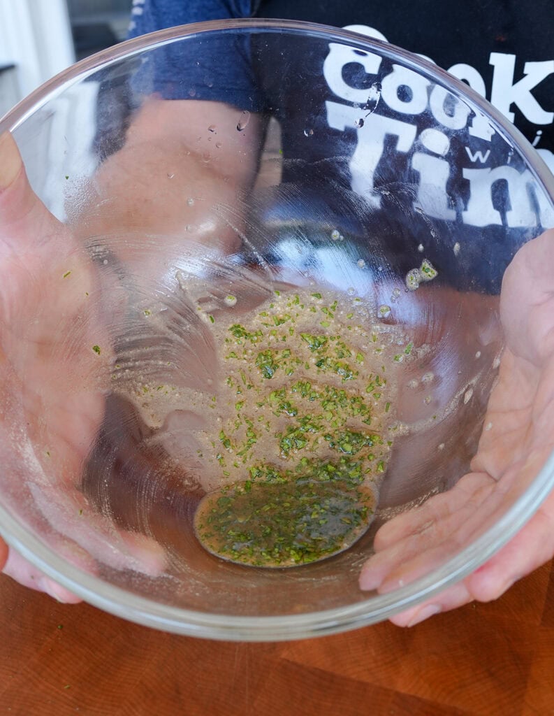 A bowl of oil rub for the cod fish. 