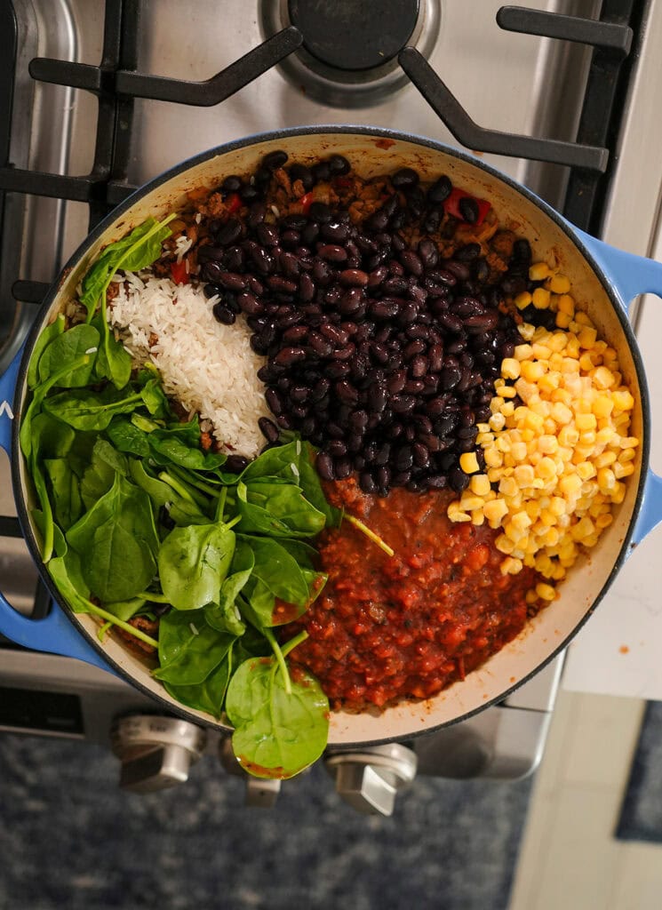 A top view of the ingredients going into the skillet on the stove. 
