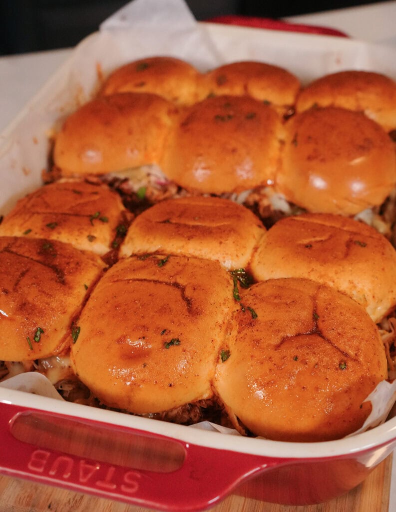 Top view of sliders showing toasted top with butter and BBQ seasoing.