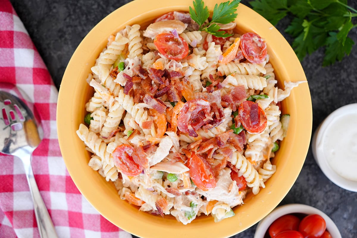 A bowl of creamy Chicken Bacon Ranch Pasta Salad.