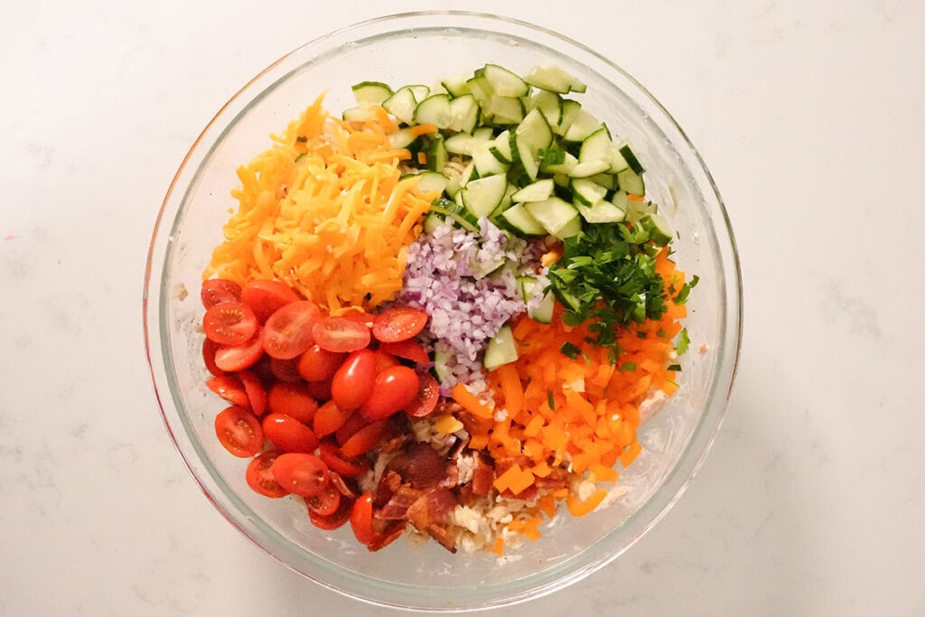 A glass bowl showing all the ingredients