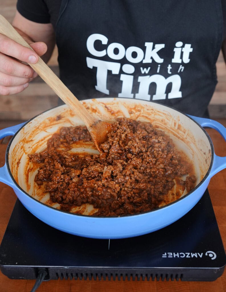 A top view of chili simmering. 