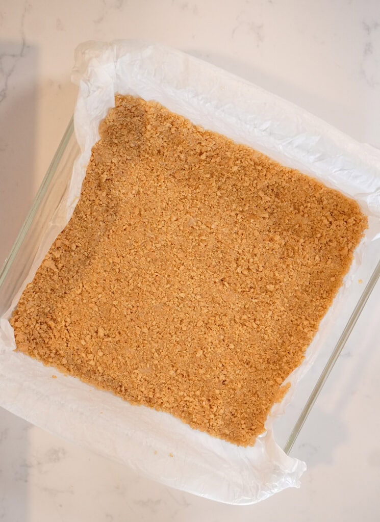 Graham Cracker crust pressed down in a baking dish. 