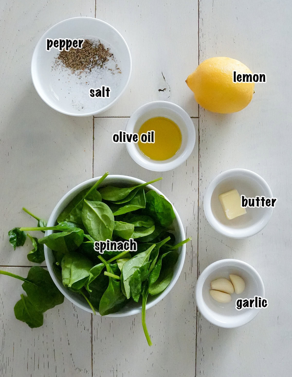 Ingredients measured out for making sautéed spinach.