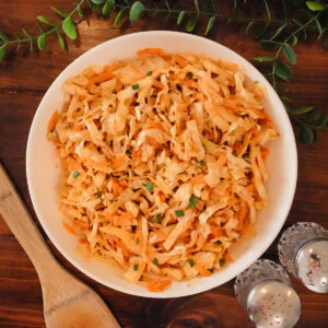 a bowl of bbq coleslaw with shredded cabbage.